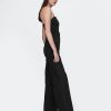 Tuta in denim senza spalline Tuta in denim senza spalline
