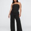 Tuta in denim senza spalline Tuta in denim senza spalline