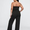 Tuta in denim senza spalline Tuta in denim senza spalline
