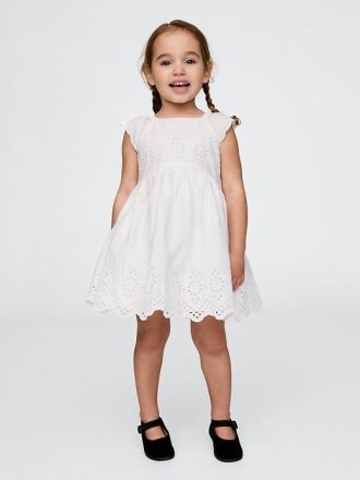 Vestito con occhielli per neonati e bambini