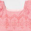 Vestito con occhielli per neonati e bambini